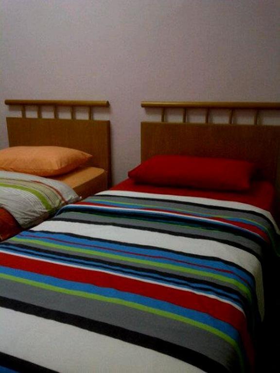 Marina Condominium Holiday Homestay Кота-Кинабалу Номер фото