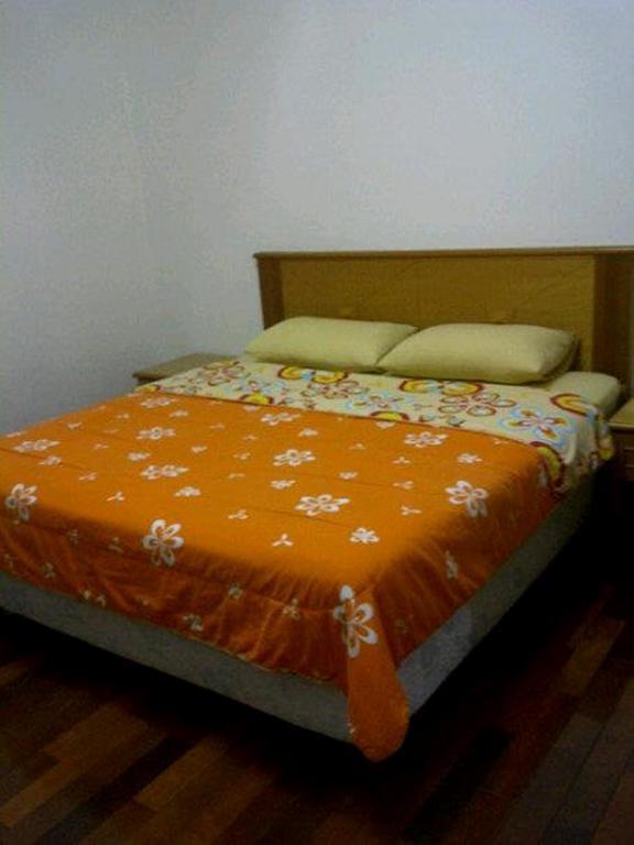 Marina Condominium Holiday Homestay Кота-Кинабалу Номер фото