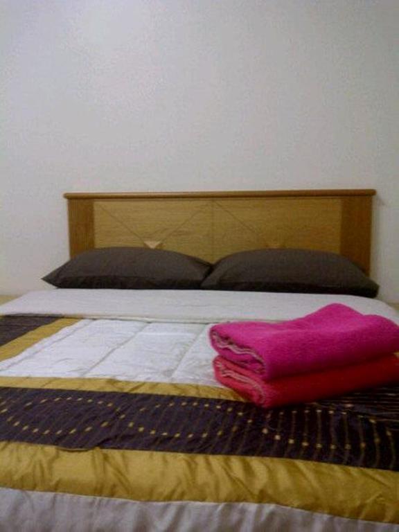 Marina Condominium Holiday Homestay Кота-Кинабалу Номер фото