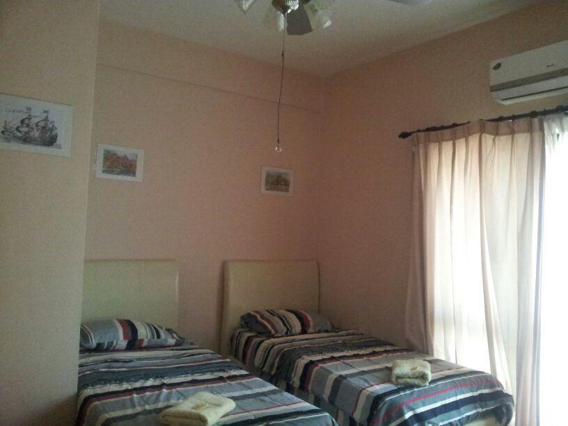 Marina Condominium Holiday Homestay Кота-Кинабалу Номер фото